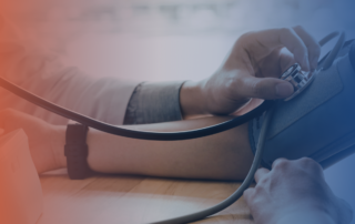 Doctor checking blood pressure during ENG1 medical examination for seafarer fitness assessment before offshore or maritime work