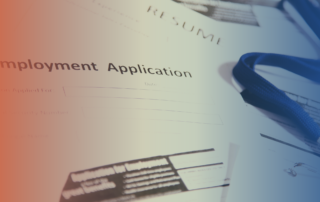 Close-up of a job application form and pen with a soft gradient overlay, representing building a strong maritime CV for seafarer and offshore job applications.